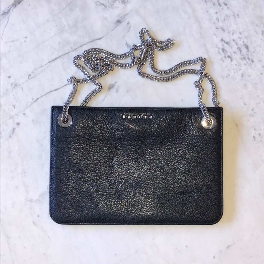 Clutch bag bi-color with two pockets